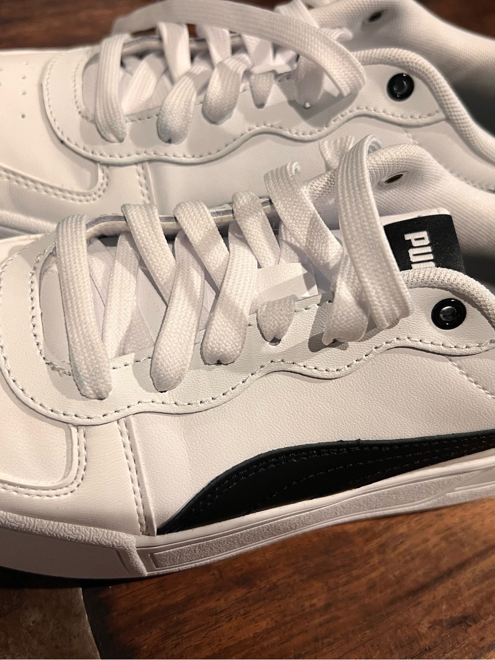 Puma White Sneakers with Black Accent